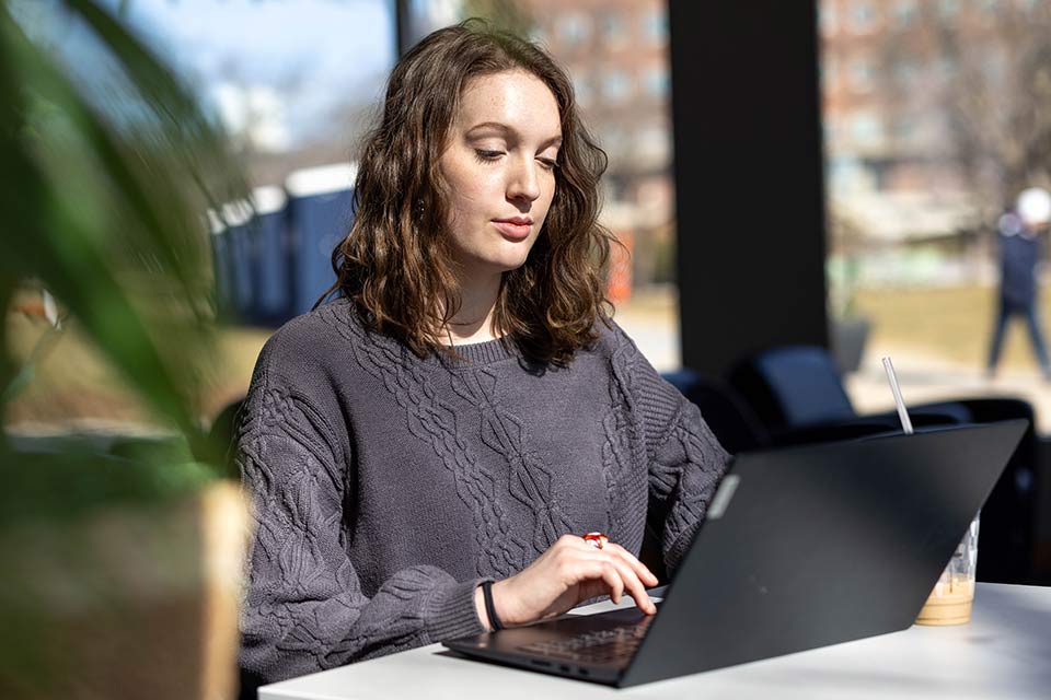 A student working at a computer