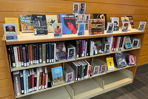 a display of books highlighting black women history makers