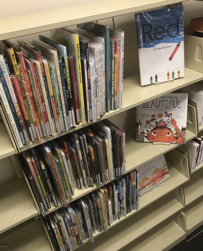 Shelf of picture books in the Library.