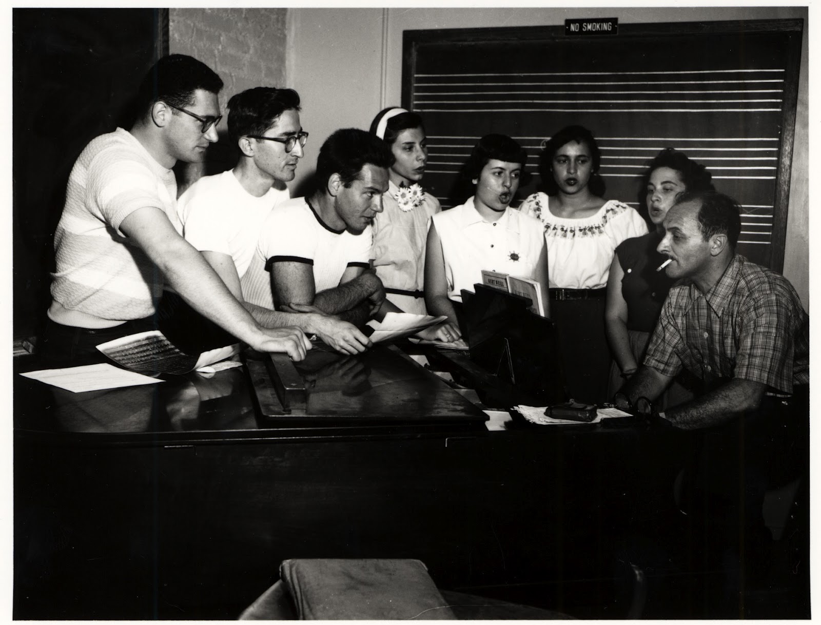 Mark Blitzstein practicing with choral students