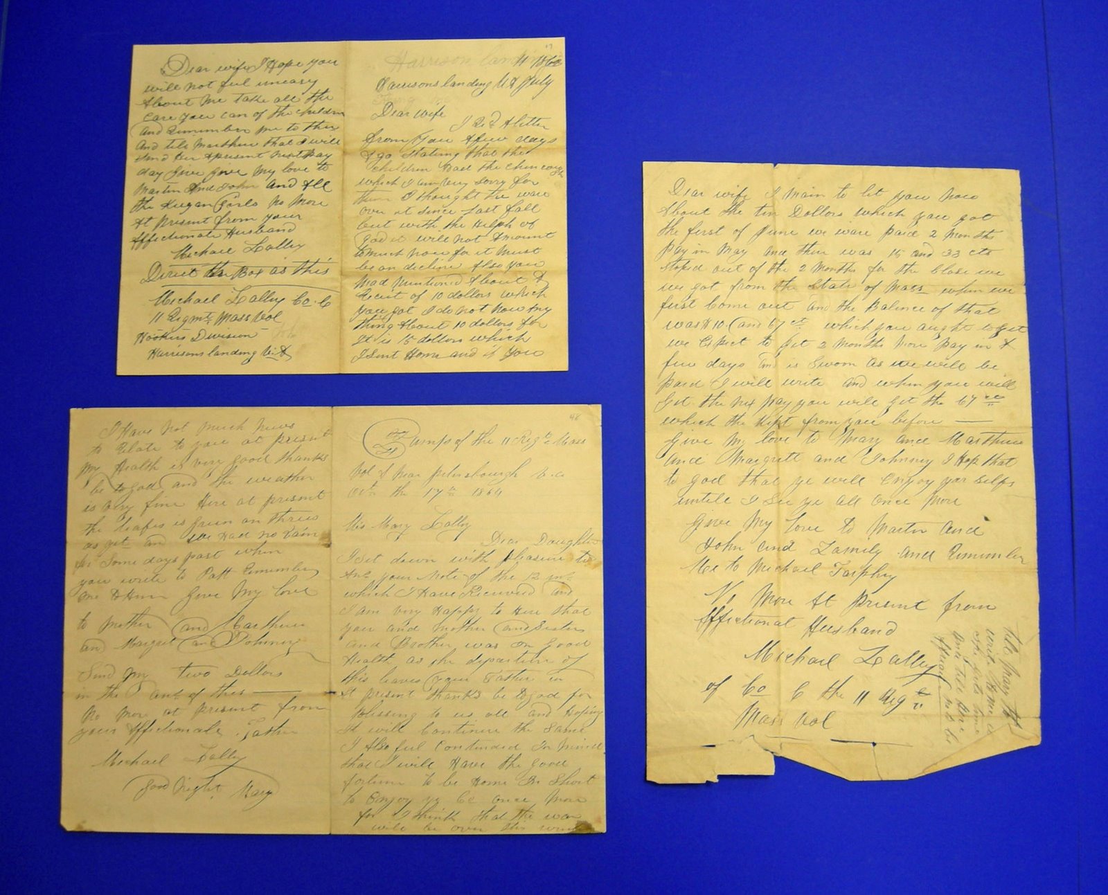 Three pages worth of letters written in cursive ink by Michael Lally during the American Civil War