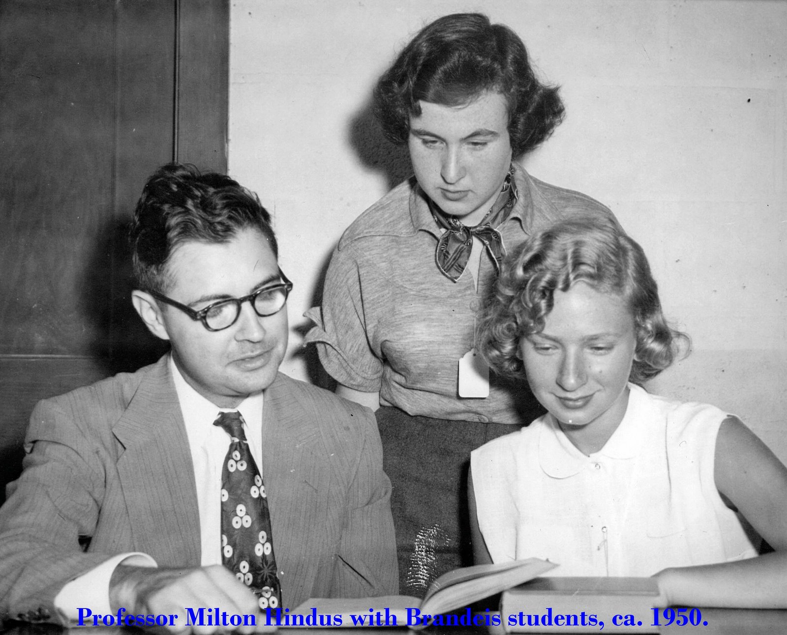 Black and white photograph of Professor Milton Hindus with Brandeis students circa 1950