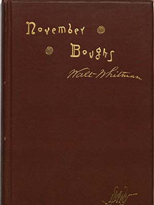Red front cover of Whitman's "November Boughs"