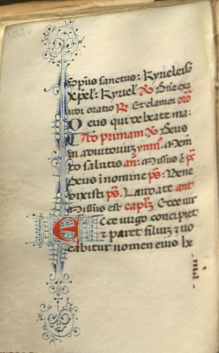 Illuminated letter E  with penwork flourishing in the borders rom the 15th-century Italian Book of Hours.