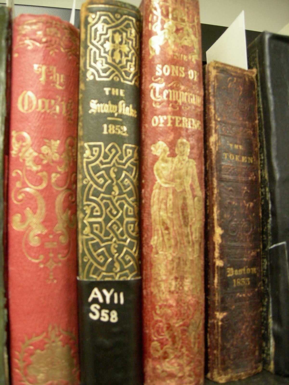 Spines of rare books gifted to the Brandeis collection
