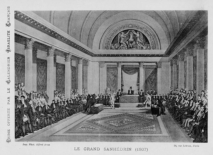 An engraving of Le Grand Sanhedrin (1807) shows a large high ceilinged court room with columns, people seated along both sides of the large room, and someone presiding at the far end.