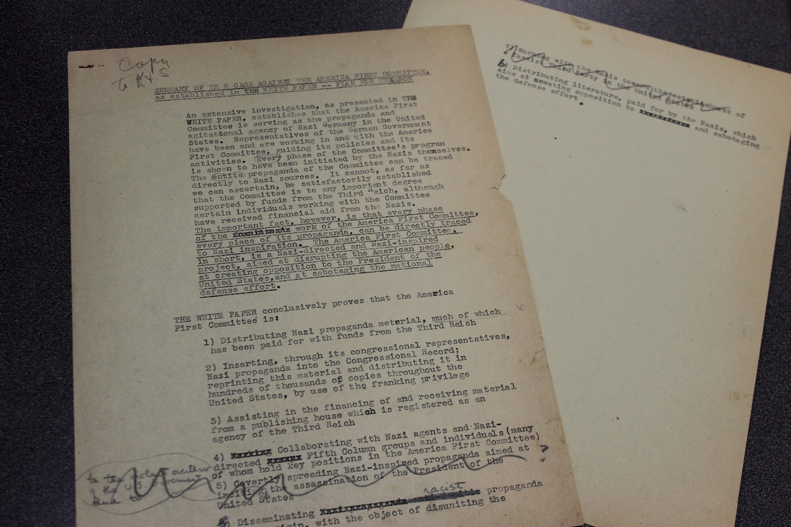 Two Typewritten pages of an unpublished  manuscript,  "The White Paper," which reference investigations of the America First Committee 