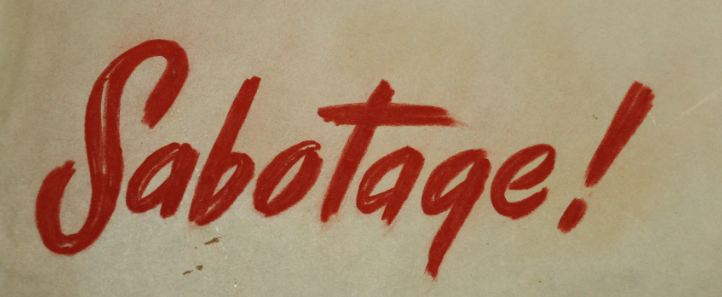 Cropped image of book title, text: Sabotage! -- written in red brush script