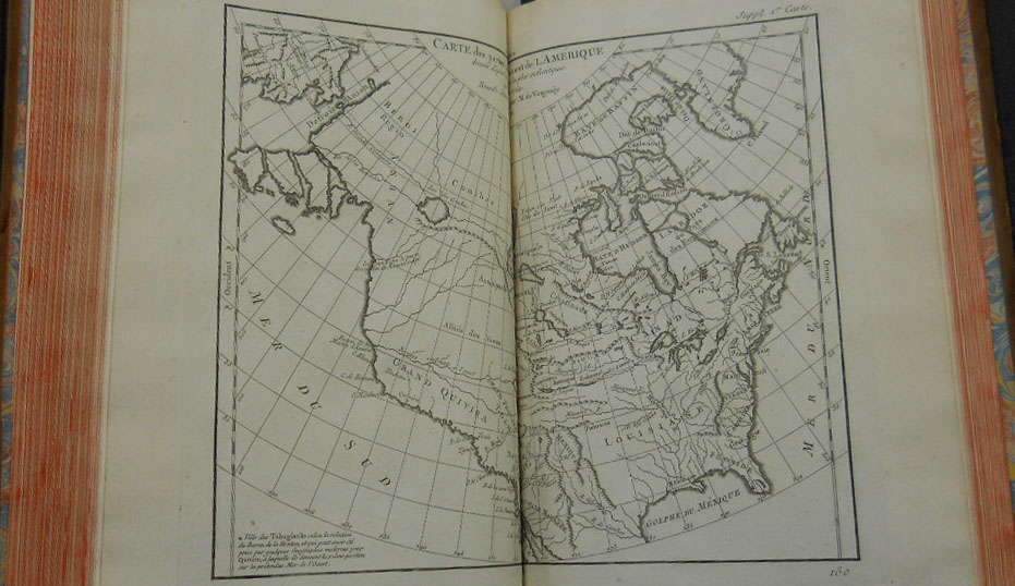 A map of North America in an open book.