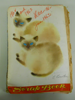 Cover of scrapbook with illustration of a kitten, and handwritten at the top it says: 1962 and 1963. Dec 1962 - Jan. 1963