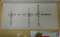 A card with the words "Last of the Red Hot Mamas" displayed horizontally.  The date january thirteenth seventy five is written vertically, crossword puzzle style.