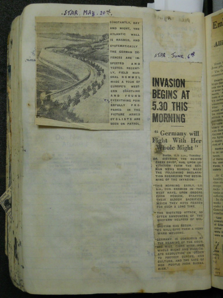Star May 20 entry with news article clipping title d"Invasion begins at 5:30 this morning" with a page of handwritten text