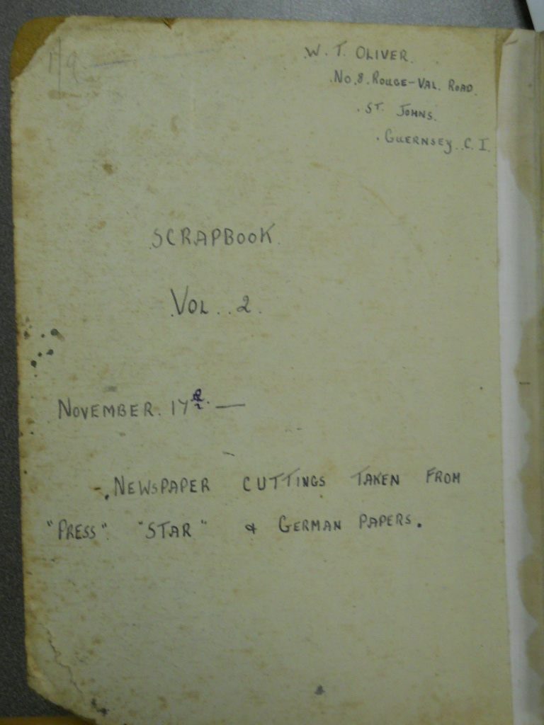 Inside cover of scrapbook, volume 2 with handwritten text: Newspaper cuttings taken from Press, Star and German papers