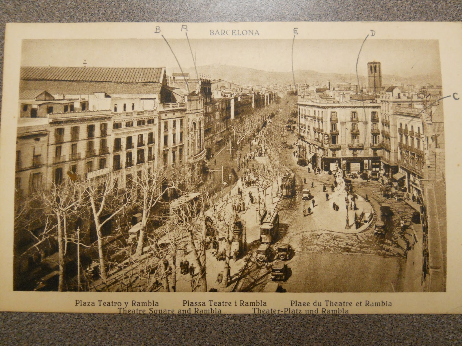 Post card of Barcelona marked with letters pertaining to the handwritten notes on the reverse side.
