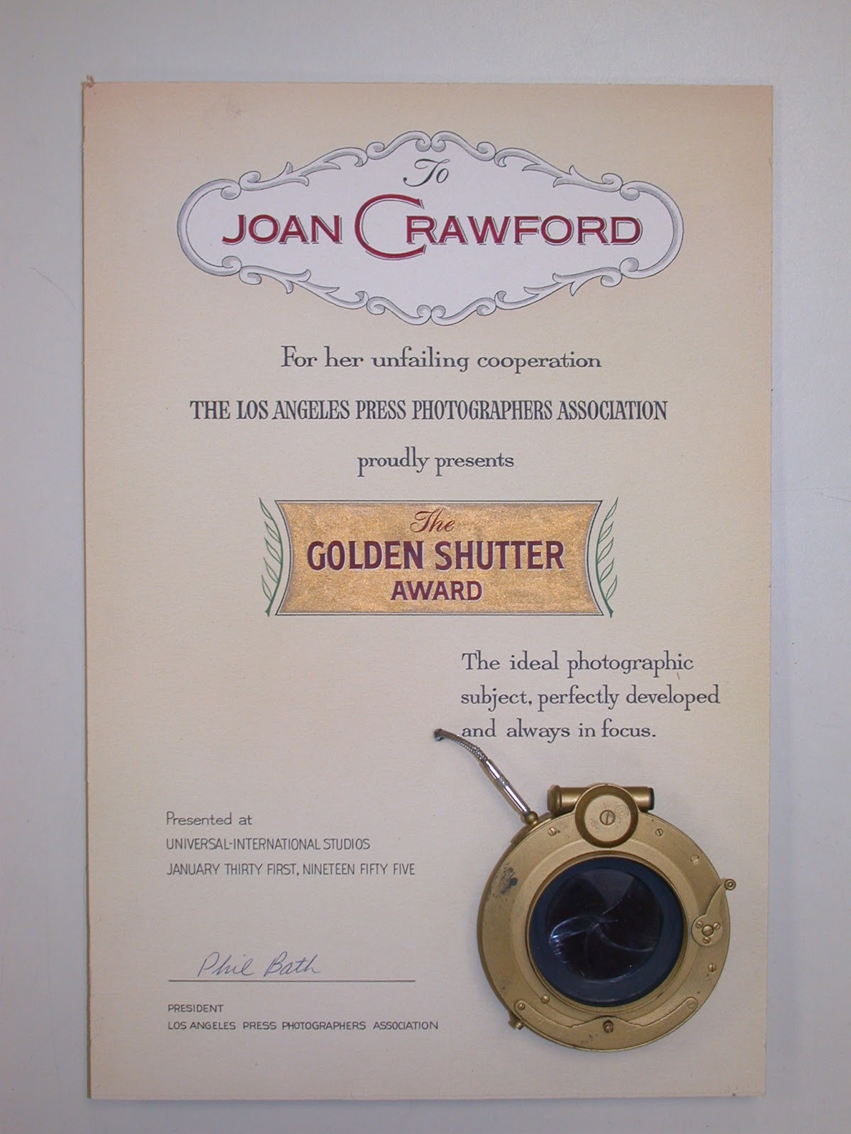 Golden Shutter Award presented to Joan Crawford by the Los Angeles Press Photographers Association