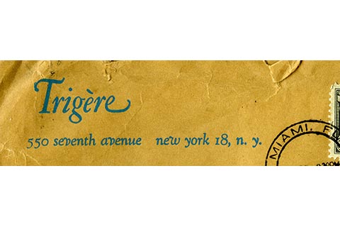 Envelope letterhead: Trigere is written in script typeface in turquoise, with address below on a manila envelope