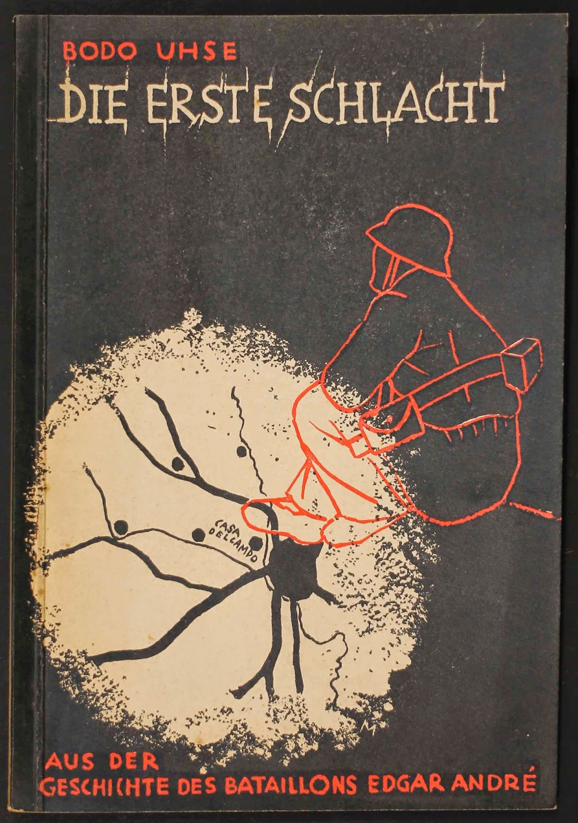 "Die erste Schlact" with cover showing a line drawing of a soldier superimposed over a section of a map labeled casa delcamp.