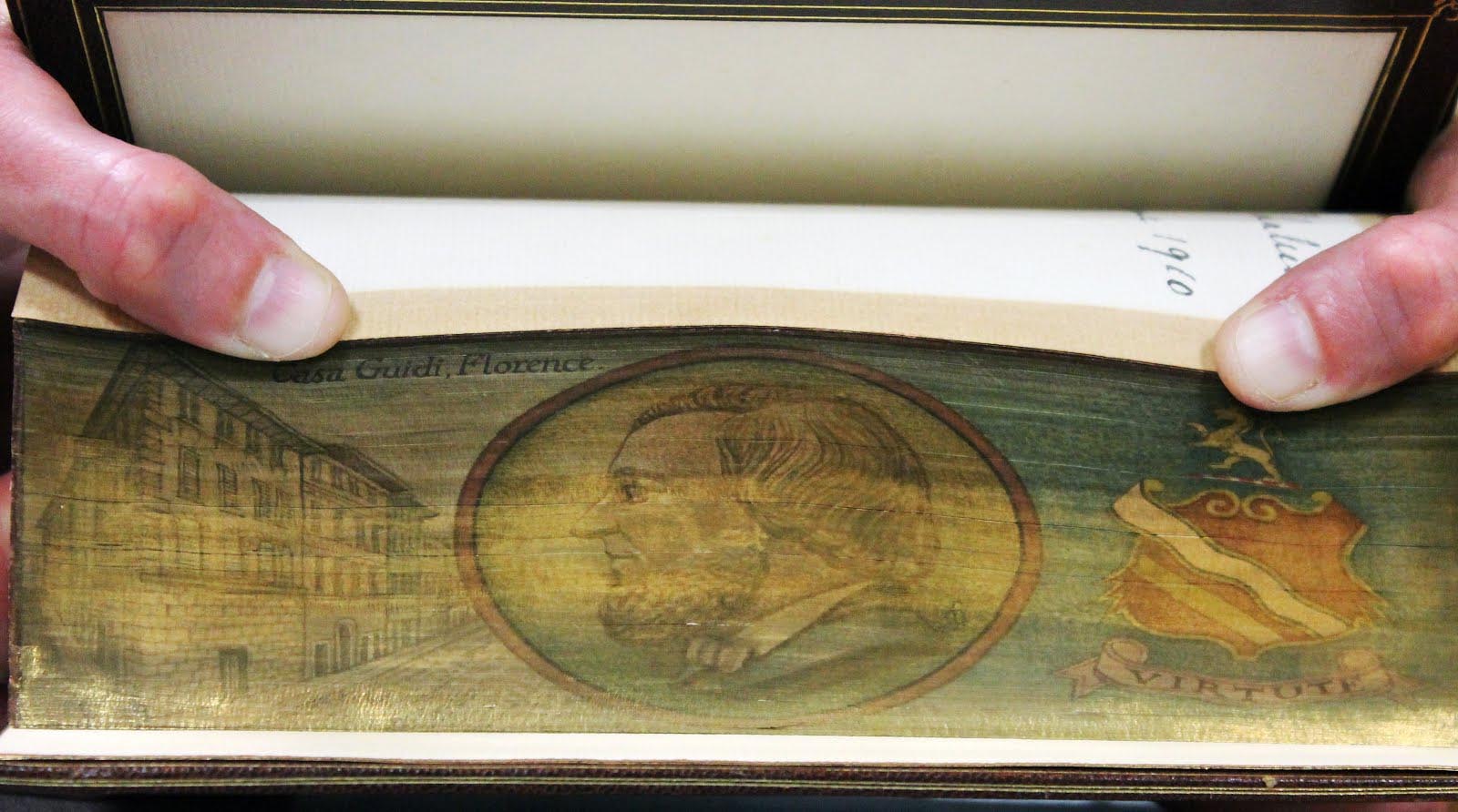 Colorful fore-edge painting of a street in Casa Guidi, Florence with a side profile of a man in the center and a red crest on the right side
