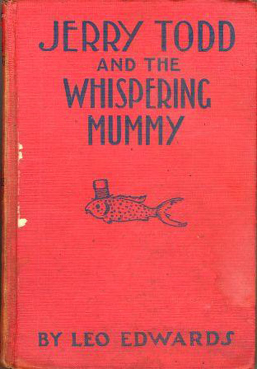 Red book cover with a fish wearing a tophat for "Jerry Todd and the Whispering Mummy" by Leo Edwards