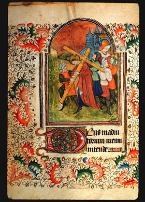 Page 52v, containing a painting of Christ Carrying of the Cross. There is a full painted border filling the page with achantus scrolls in red and blue, and leaf and vine patterning. 