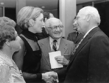 L to R: Thelma Sachar, Elizabeth Rosenstiel Kabler, and Abram Sachar seen here with former President of Israel, Ephraim Katzir. Rosenstiel Kabler is shaking hands with Katzir.
