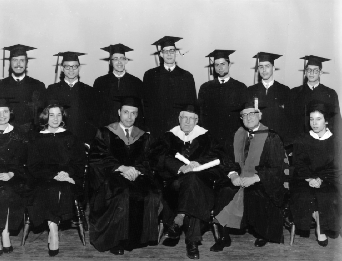 Group photo of Phi Beta Kappa students and faculty at the Phi Beta Kappa Installation. Everyone is wearing academic regalia.
