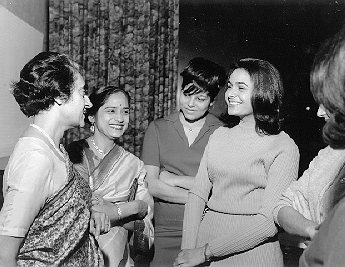 Indira Gandhi speaks to a group of students
