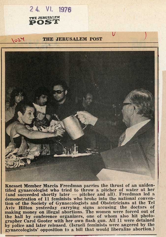 A photo published in the Jerusalem Post of a person trying to throw water at Marcia Freedman.