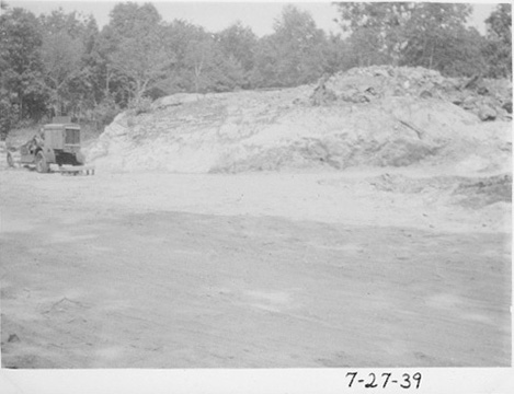 Excavation of the site for Ford Hall. Picture shows a construction vehicle on the site.