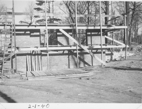 Photo of building under scaffolding.