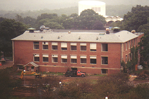 Building with all windows removed in preparation for demolition