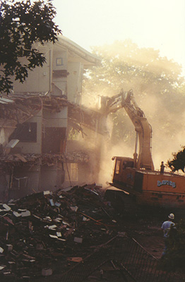 An excavator tearing down a corner of Ford Hall.