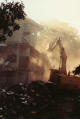 An excavator tearing down a corner of Ford Hall.