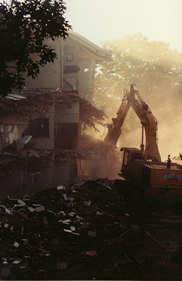 An excavator tearing down a corner of Ford Hall.