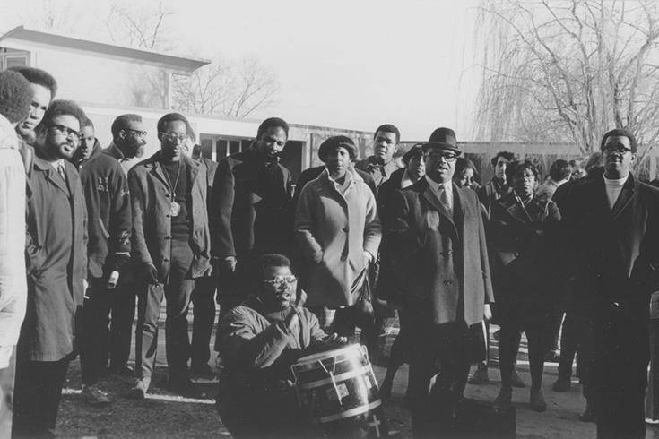 Students gather in front of Ford Hall to protest