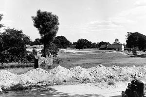 Site of the Chapel with mounds of dirt.