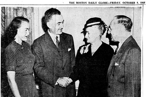Clipping from the Boston Daily Herald about the inauguration, with photograph of Mrs. Susan Brandeis Gilbert shaking hand with Eliahu Epstein, minister of Republic of Israel to the United Nations, flanked on either side by Alice Brandeis Gilbert and Brandeis University President Dr. Sachar. Dated October 8, 1948.