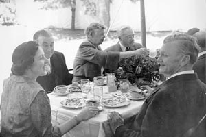 First Board of Trustees Luncheon. L to R are: Thelma Sachar, Mass. Gov. Paul Dever, Eleanor Roosevelt, Abram Sachar and George Alpert are seated around the luncheon table, ca. 1951. Ralph Norman Collection.