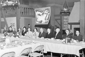 Canton, Ohio Chapter of Women's Committee, seated at a long table. 1951. 