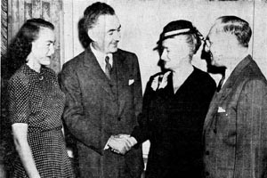 Continuation of Boston Daily Globe article about the inauguration, with photograph of Alice Brandeis Gilbert; Eliahu Epstein, minister of Republic of Israel to the United Nations; Mrs. Susan Brandeis Gilbert; and Dr. Abram Leon Sachar, president of Brandeis University. Epstein shakes hand with Susan Brandeis Gilbert. The clipping is dated October 8, 1948.