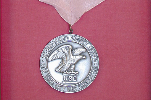 Medal on a pink ribbon