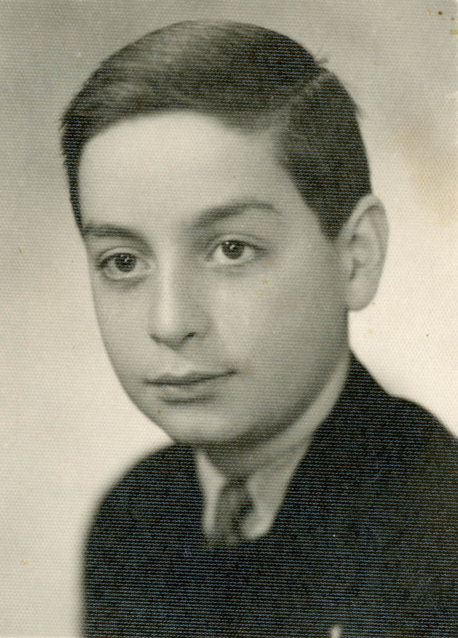 1/4 headshot of boy about age 10, in jacket and tie
