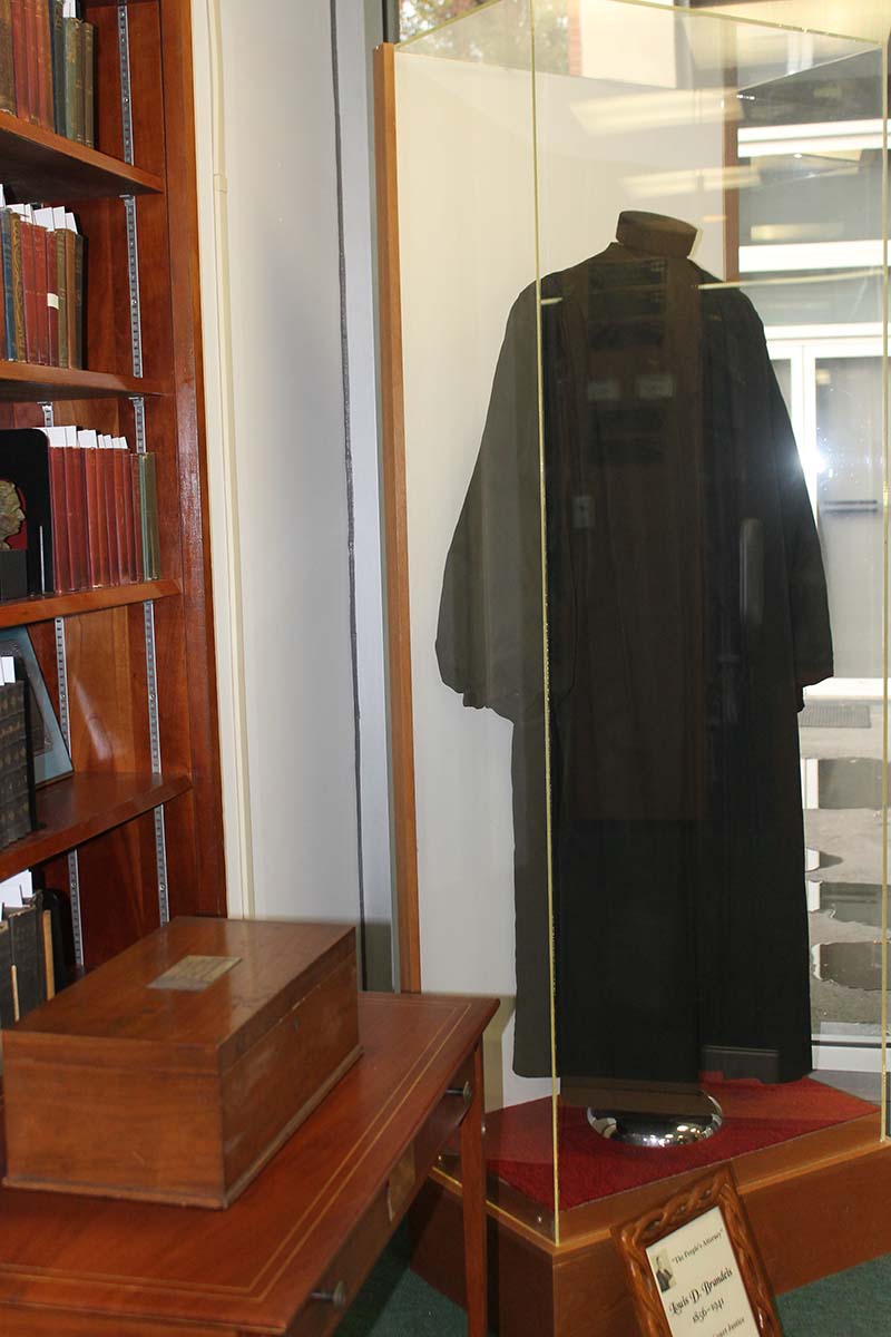 Brandeis's Supreme Court robe, table, bookcase, box, plaque