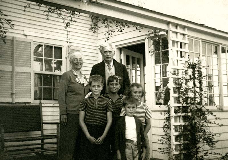 Louis D. Brandeis, Alice G. Brandeis, and their four grandchildren standing in a porch