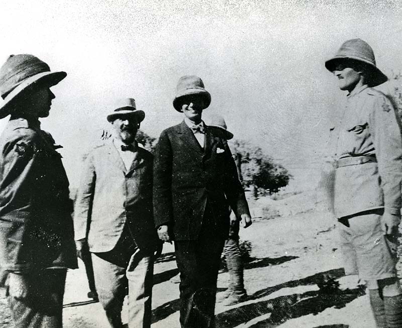 Smiling Louis D. Brandeis and Jonas Friedenwald in Palestine in the company of other men (black and white photograph, circa 1919)