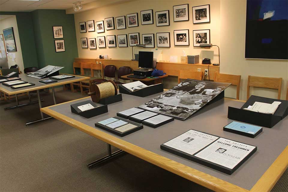 Archival materials spread out on tables