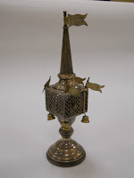 Rritual object (spice box) with flag on top