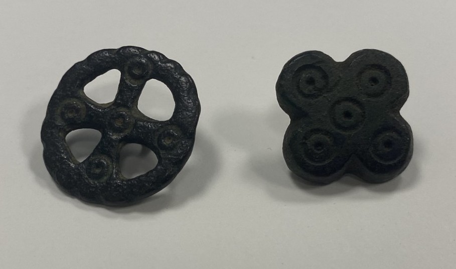 Photo of two small buttons