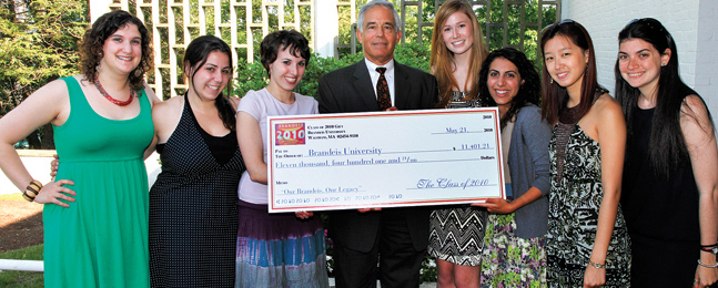 Photo of Jehuda Reinharz accepting the senior class gift from Class of 2010 