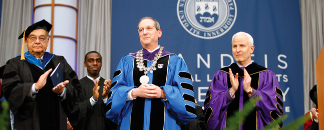 Board of Trustees chairman Malcolm L. Sherman, student union president Daniel Acheampong ’11, President Fred Lawrence, Northwestern University president Morton Schapiro